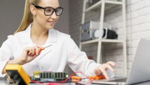 Unleashing the Power of FPGA Testing: Mastering the Art of Test Benches front-view-female-technician-with-electronics-laptop