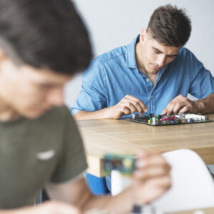 Verilog Testbench: A Comprehensive Guide for Beginners it-students-fixing-hardware-equipment-s