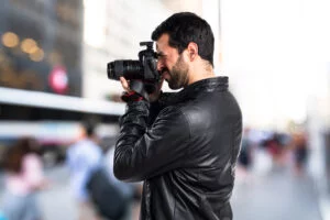 FPGAs in Photography: Capturing Moments with Precision and Speed Man with leather jacket photographing