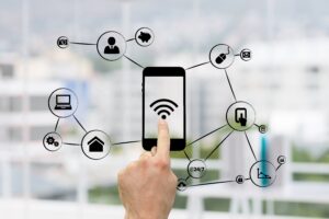 Beamforming & MIMO in Wireless Communication composite of hand using smartphone with graphics